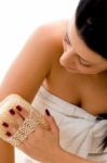 Top View Of Woman Scrubbing Her Arms On An Isolated White Background Stock Photo