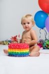 Baby Girl Celebrating Her First Bithday With Gourmet Cake And Ba Stock Photo