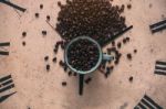 Cup Of Beans On Clock Stock Photo