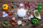 Raw Dough With Ingredients For Homemade Pizza On Shabby Wooden B Stock Photo