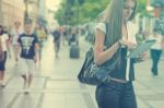 Young Business Woman With Tablet Computer Walking On Urban Stree Stock Photo