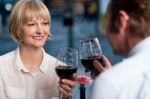 Couple Toasting Wine Glasses Stock Photo