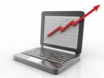 Laptop With Business Graph Stock Photo