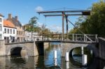 Bridge Over A Canal In Bruges West Flanders In Belgium Stock Photo