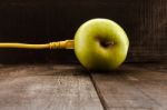 Green Apple Connected To A Data Network Stock Photo