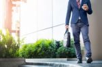 Young And Successful Businessman Is Reading A Message On His Sma Stock Photo