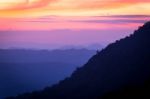 Soft Focus And Blur Beautiful Landscape On The Top Of Mountains With The Sun At Dawn Stock Photo