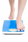 person standing on Weight Scale Stock Photo