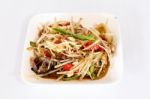 Thai Food Papaya Salad On White Dish Stock Photo