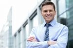 Young Corporate Man Posing Confidently Stock Photo