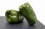 Two Green Bell Peppers Stock Photo