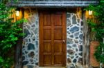 Wooden Door In The Evening Stock Photo