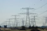 Electric Transmission Lines Lead Away Stock Photo