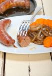 Beef Sausages Cooked On Iron Skillet Stock Photo