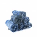 Stack Of Rolled Jeans Stock Photo