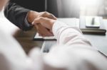 Two Confident Business Man Shaking Hands During A Meeting In The Stock Photo