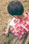 Back View. Boy Writing On Notebook. Education Concept. Vintage S Stock Photo