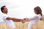 Lovers In Open Place Stock Photo