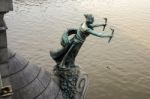 Statue Of A Woman With Torches On The Cechuv Bridge In Prague Stock Photo