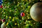 Close Up Big Yellow Glitter Ball Christmas On Tree With Wire White Light Background Stock Photo