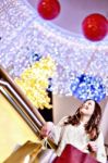 Beautiful Young Woman Holding Shopping Bags Stock Photo