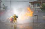 Fireman. Firefighters Fighting Fire During Training Stock Photo