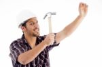 Engineer In Action With Hammer Stock Photo