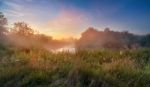 Summer Misty Sunrise On The River. Foggy River In The Morning. P Stock Photo