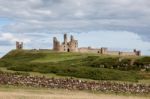 View Of Dunstanburgh Castle Stock Photo