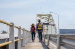 Couple Tourists Enjoy The Bridge Stock Photo