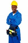 African Worker With Arms Crossed Stock Photo