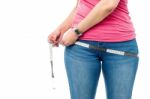 Closeup Picture Of Woman With Measure Tape Stock Photo