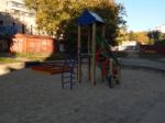 Children Playground, Swing Near The House  Stock Photo