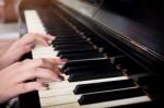 Close-up Of A Music Performer's Hand Playing The Piano Stock Photo