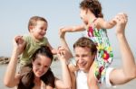 Family In The Beach Stock Photo