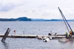 Destroyed  By Thunderstorm Piers With Boats In Verbania, Italy Stock Photo