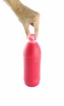 Red Water Bottle In Grasp Finger Hand On White Background Stock Photo