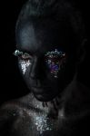 Girl In Black Makeup With Sparkles Stock Photo