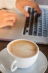 Woman Working With Laptop And Hot Coffee Stock Photo