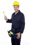 Young Worker Holding Hammer Stock Photo