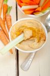 Fresh Hummus Dip With Raw Carrot And Celery Stock Photo