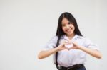 Portrait Of Thai High School Student Uniform Beautiful Girl Give Heart Stock Photo