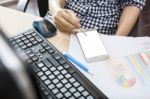 Hand Of Working Woman With Smart Phone Writing Pen On Touching Screen With Copy Space On Office Working Table Stock Photo