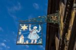 Hanging Sign In Riquewihr In Haut-rhin Alsace France Stock Photo