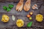 Italian Foods Concept And Menu Design. Dried Homemade Fettuccine Stock Photo