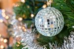 Christmas Ball With Mirrors Hanging In Tree Stock Photo