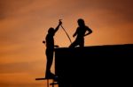 Silhouettes Of Worker Welder Stock Photo