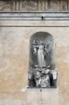 Angels And Babies Statue On The Facade Of The Collegiate Church Stock Photo