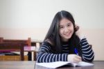 Portrait Of Thai Teen Beautiful Girl Writing Book Stock Photo