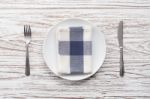 Empty Plate Napkin Fork Knife Silverware White Wooden Table Background Stock Photo